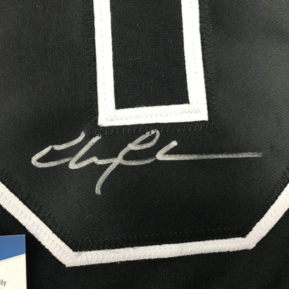 Autographed/Signed Chevy Chase Clark Griswold Christmas Vacation Movie Chicago Black Hockey Jersey Beckett BAS COA