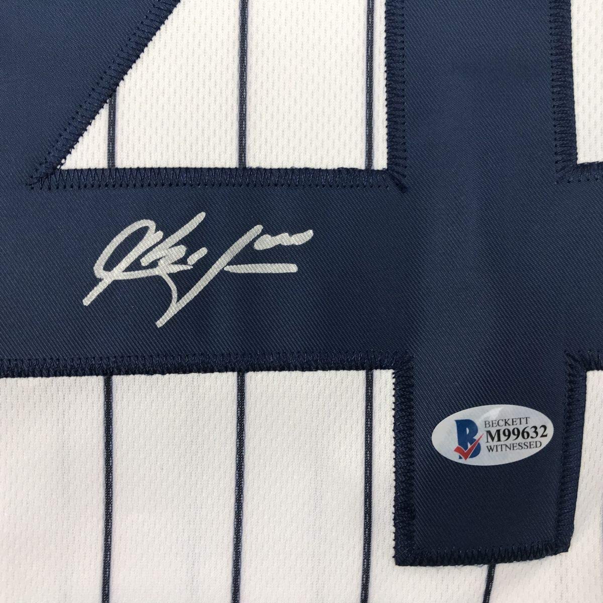Autographed/Signed Aroldis Chapman New York Pinstripe Baseball Jersey Beckett BAS COA Holo Only
