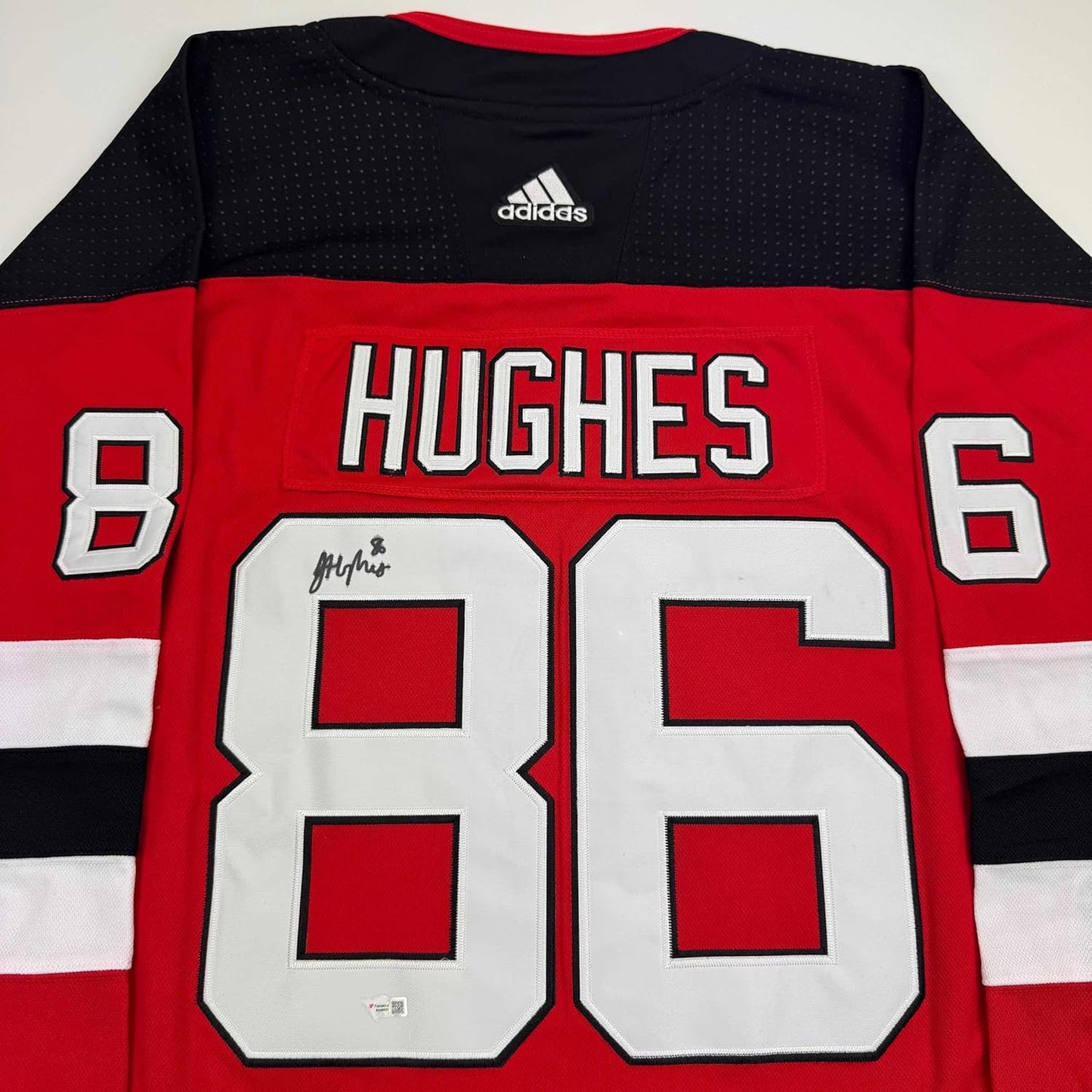 Framed Autographed/Signed Jack Hughes 35x39 New Jersey Devils Authentic Red Hockey Jersey Fanatics COA