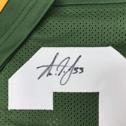 Autographed/Signed Aaron Jones Green Bay Green Football Jersey JSA COA