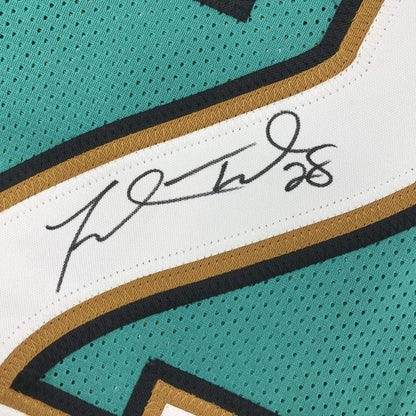 Autographed/Signed Fred Taylor Jacksonville Teal Football Jersey JSA COA