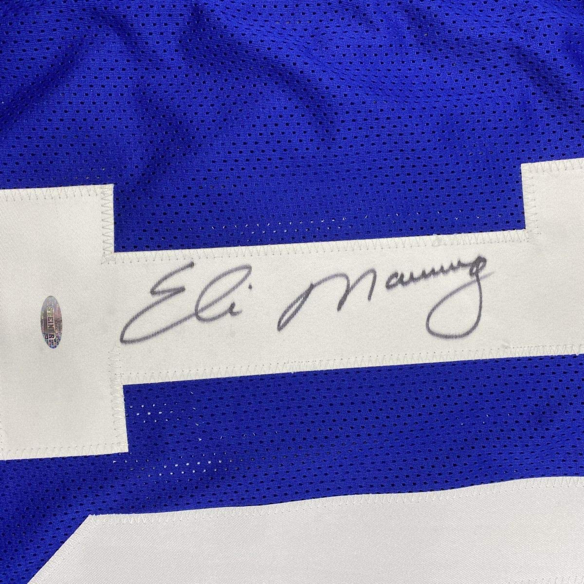 Autographed/Signed Eli Manning New York Blue Football Jersey Steiner Sports COA Hologram Only
