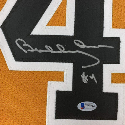 Framed Autographed/Signed Bobby Orr 35x39 Boston Yellow Hockey Jersey Beckett BAS & GNR COA