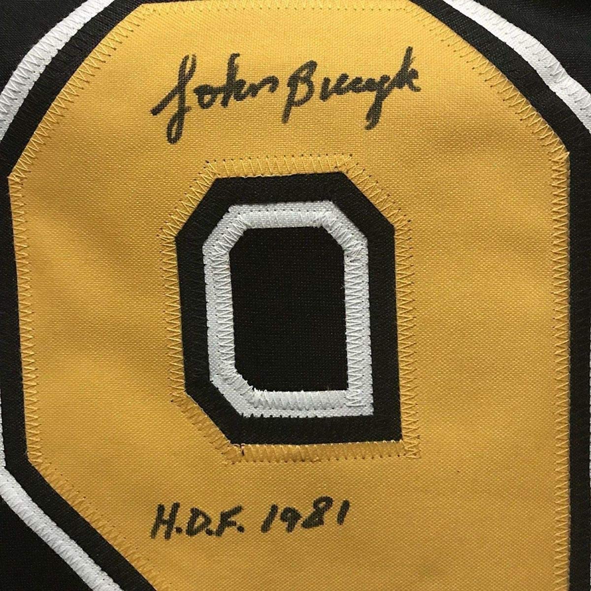 Framed Autographed/Signed John Johnny Bucyk HOF 1981 35x39 Boston Black Hockey Jersey JSA COA