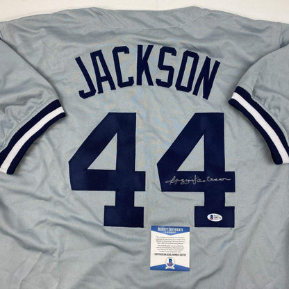 Autographed/Signed Reggie Jackson New York Grey Baseball Jersey Beckett BAS COA