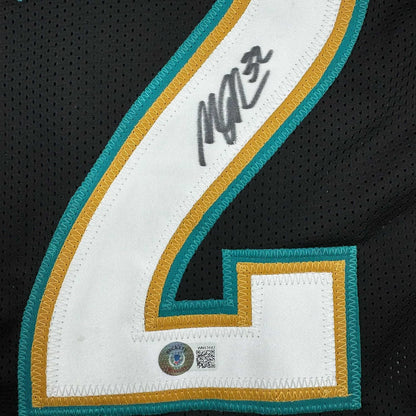 Framed Autographed/Signed Maurice Jones-Drew 35x39 Jacksonville Black Football Jersey Beckett BAS COA