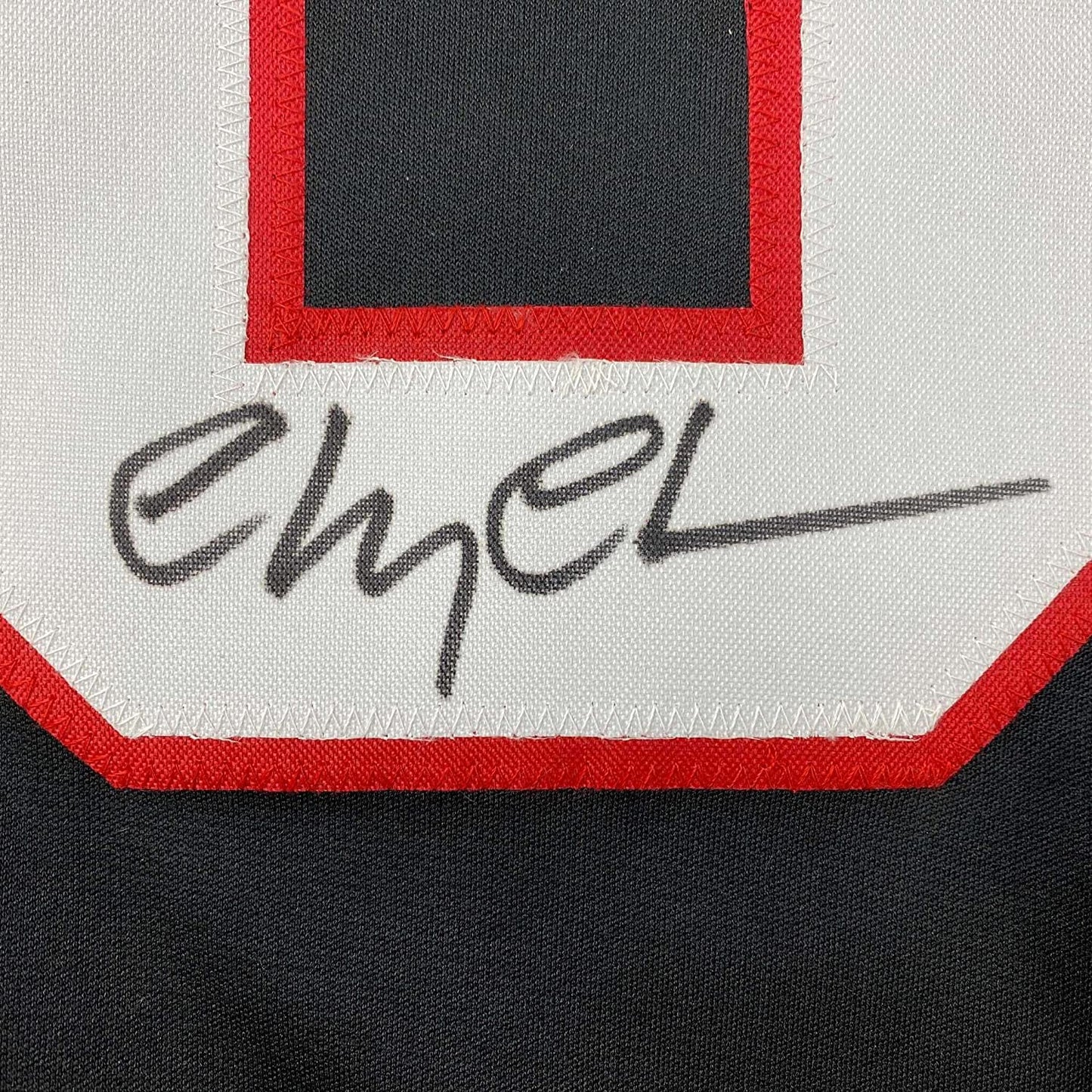 Framed Autographed/Signed Chevy Chase Clark Griswold 35x39 Christmas Vacation Movie Chicago Black Hockey Jersey Beckett BAS COA