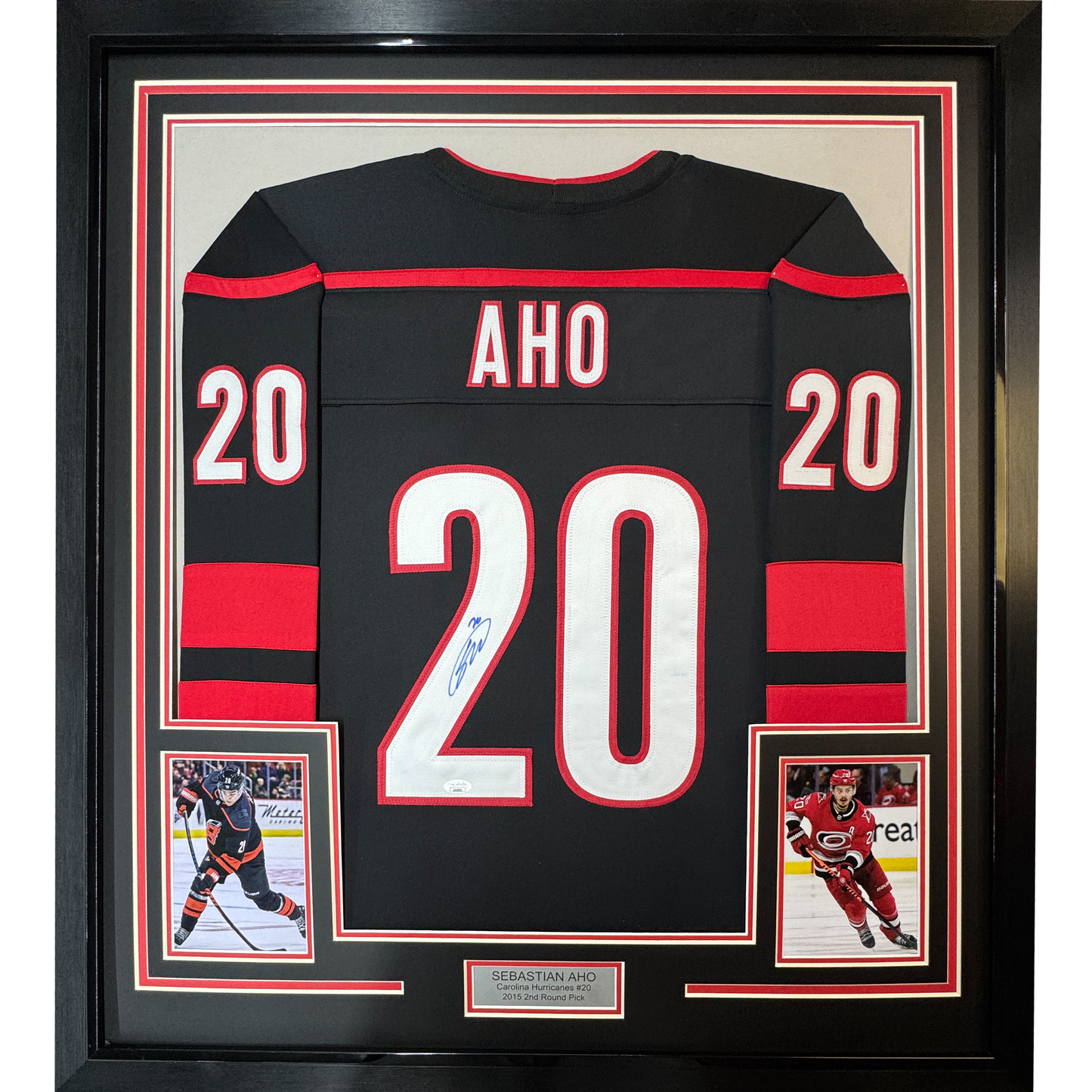 Framed Autographed/Signed Sebastian Aho 35x39 Carolina Black Hockey Jersey JSA COA