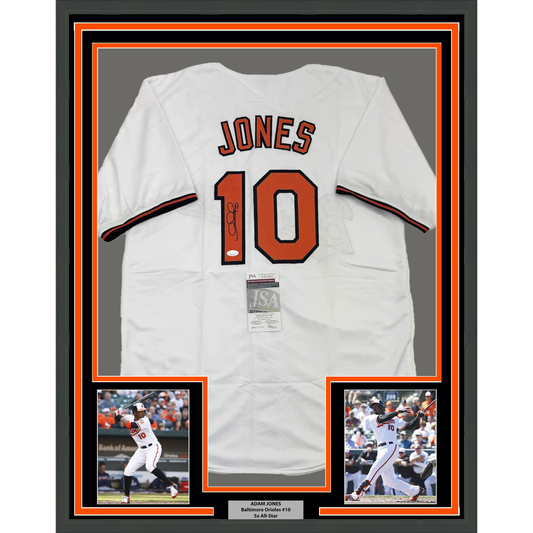 Framed Autographed/Signed Adam Jones 35x39 Baltimore White Baseball Jersey JSA COA