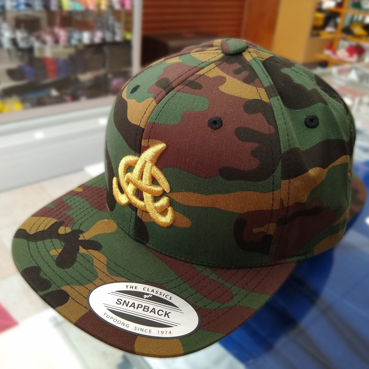 Aguilas Cibaeñas Embroidered SnapBack Camouflage Hat