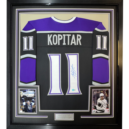 Framed Autographed/Signed Anze Kopitar 35x39 Los Angeles LA Black Hockey Jersey Beckett BAS COA #2