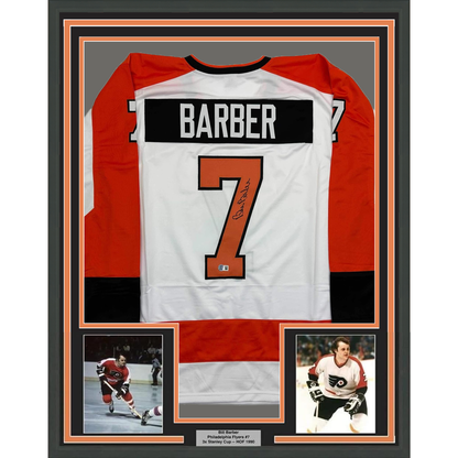 Framed Autographed/Signed Bill Barber 35x39 Philadelphia White Hockey Jersey Beckett BAS COA