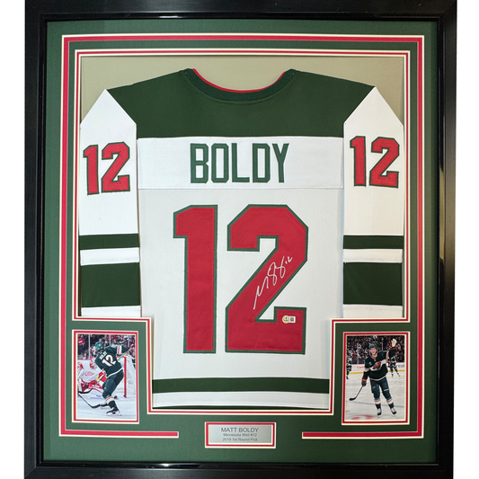 Framed Autographed/Signed Matt Boldy 35x39 Minnesota White Hockey Jersey Beckett BAS COA