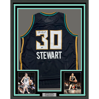 Framed Autographed/Signed Breanna Stewart 35x39 New York Black Basketball Jersey JSA COA