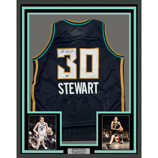 Framed Autographed/Signed Breanna Stewart 35x39 New York Black Basketball Jersey JSA COA