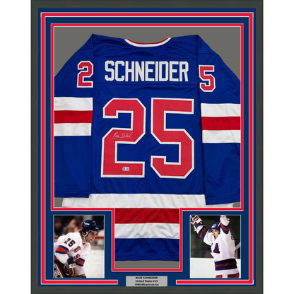 Framed Autographed/Signed Buzz Schneider 35x39 Blue Team USA Miracle On Ice 1980 Olympics Hockey Jersey Beckett BAS COA