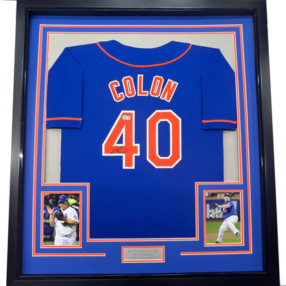Framed Autographed/Signed Bartolo Colon 35x39 New York Blue Baseball Jersey Beckett BAS COA