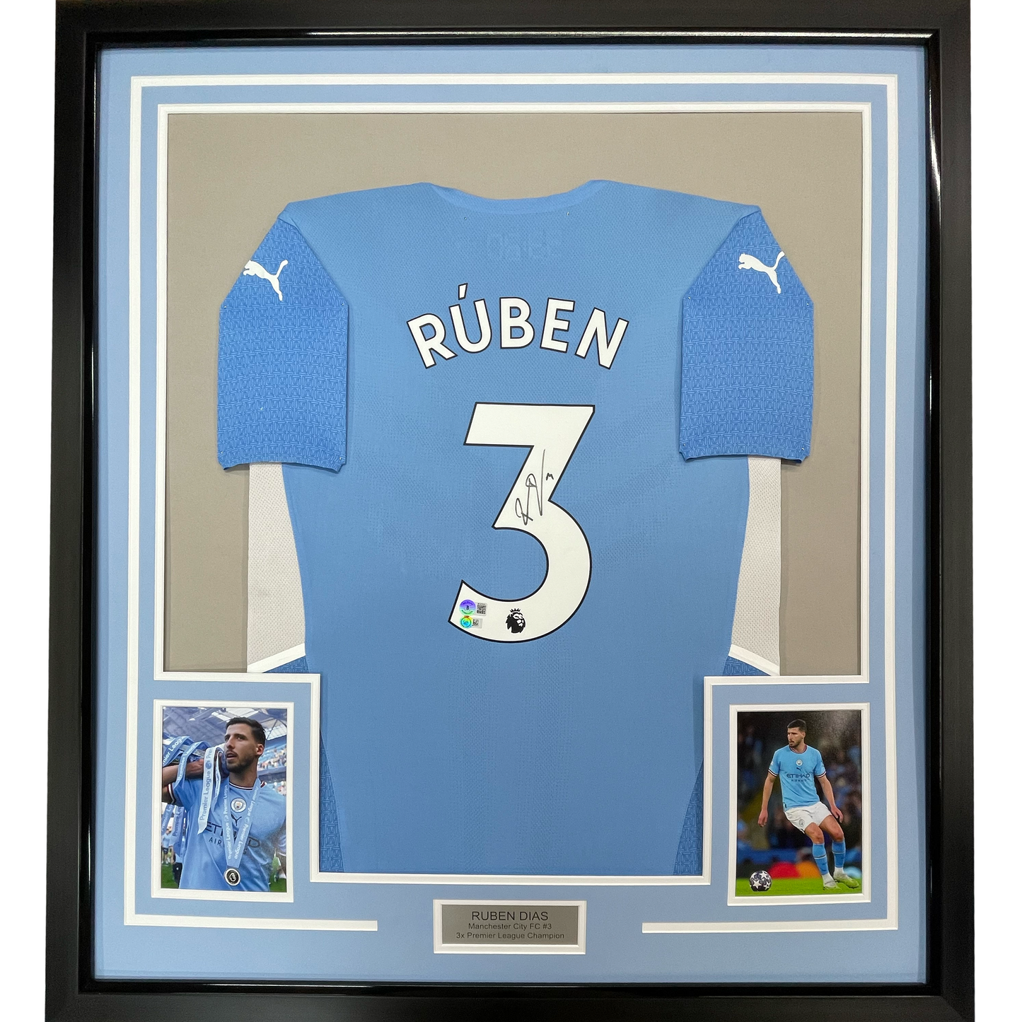 Framed Autographed/Signed Ruben Dias 35x39 Manchester City Blue Soccer Futbol Jersey Beckett BAS COA