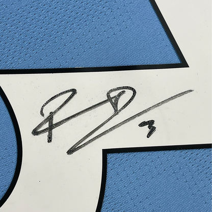 Framed Autographed/Signed Ruben Dias 35x39 Manchester City Blue Soccer Futbol Jersey Beckett BAS COA