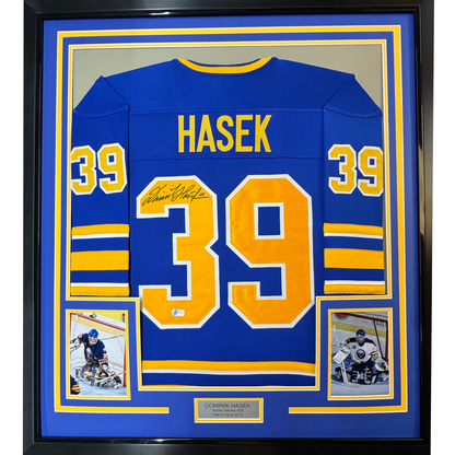Framed Autographed/Signed Dominik Hasek 35x39 Buffalo Blue Hockey Jersey Beckett BAS COA