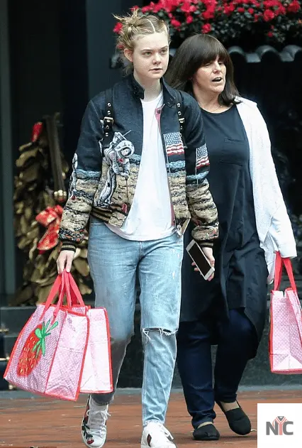 Elle Fanning Saint Laurent Moon Landing Black Varsity Jacket