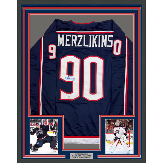 Framed Autographed/Signed Elvis Merzlikins 35x39 Columbus Blue Hockey Jersey Beckett BAS COA
