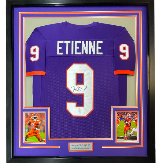 Framed Autographed/Signed Travis Etienne Jr. 35x39 Clemson Purple College Football Jersey JSA COA