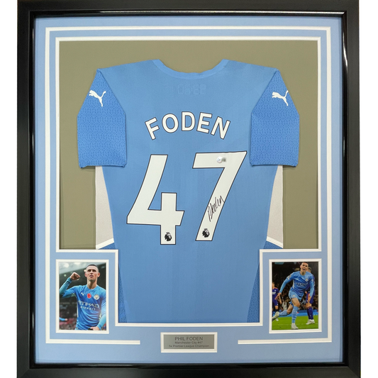 Framed Autographed/Signed Phil Foden 35x39 Manchester City Blue Soccer Futbol Jersey Beckett BAS COA