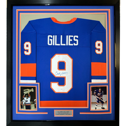 Framed Autographed/Signed Clark Gillies 35x39 New York Blue Hockey Jersey JSA COA