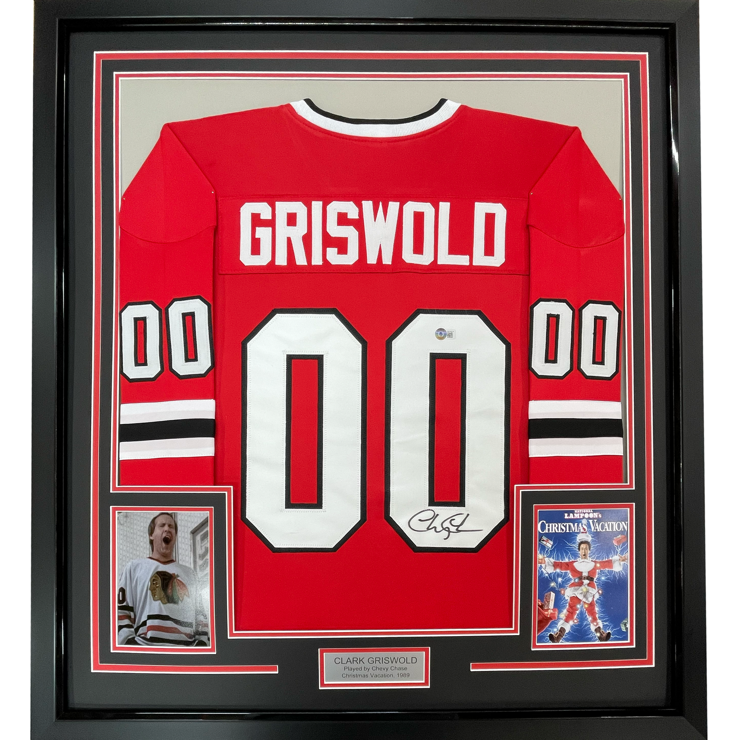 Framed Autographed/Signed Chevy Chase Clark Griswold 35x39 Christmas Vacation Movie Chicago Red Hockey Jersey Beckett BAS COA
