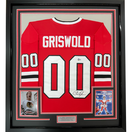 Framed Autographed/Signed Chevy Chase Clark Griswold 35x39 Christmas Vacation Movie Chicago Red Hockey Jersey Beckett BAS COA