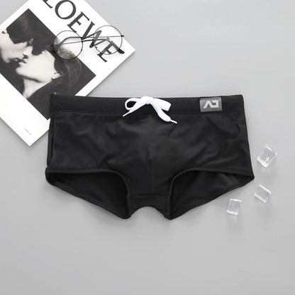 Addicted Solid Swim Trunks
