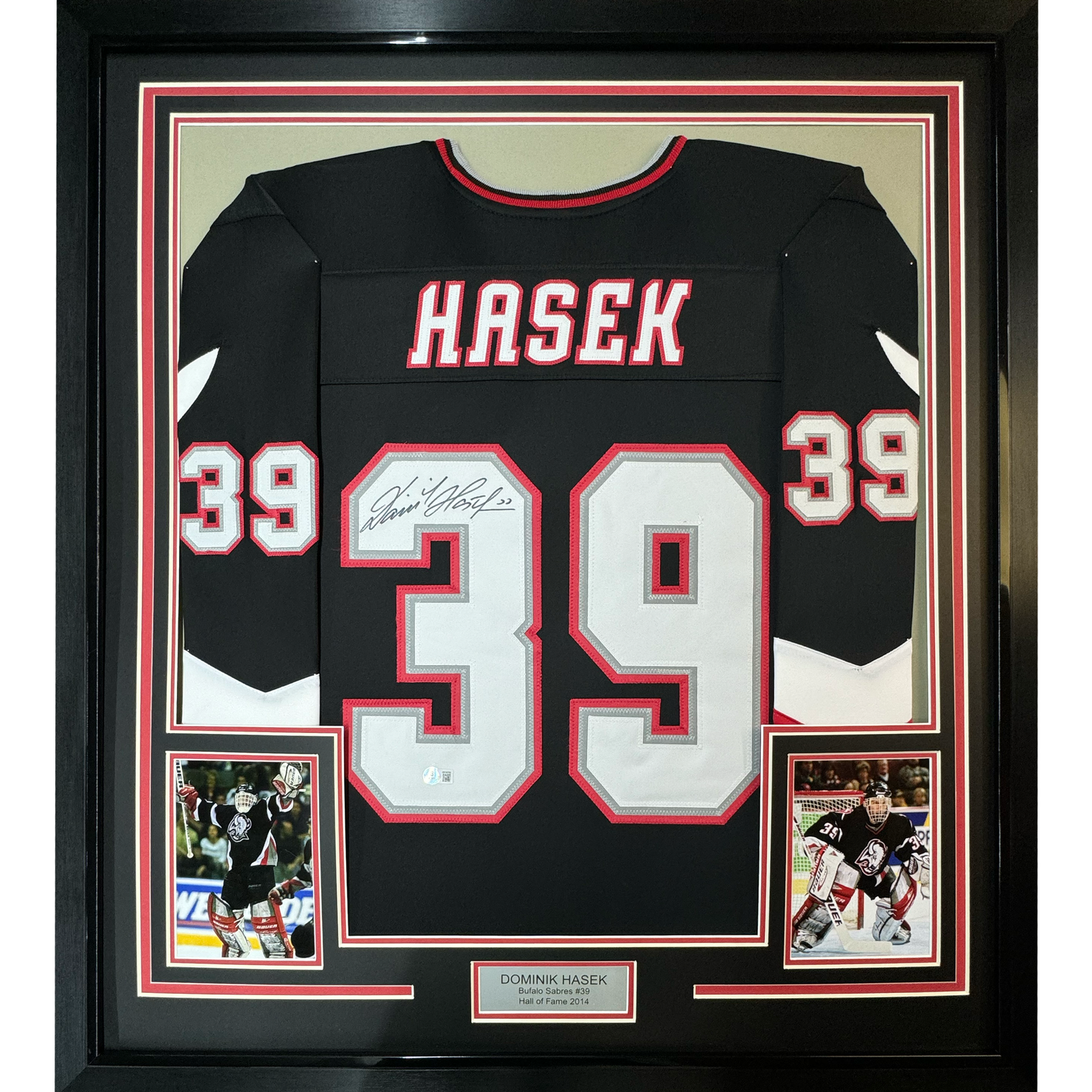 Framed Autographed/Signed Dominik Hasek 35x39 Buffalo Black Hockey Jersey Beckett BAS COA