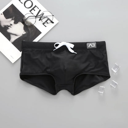 Addicted Solid Swim Trunks