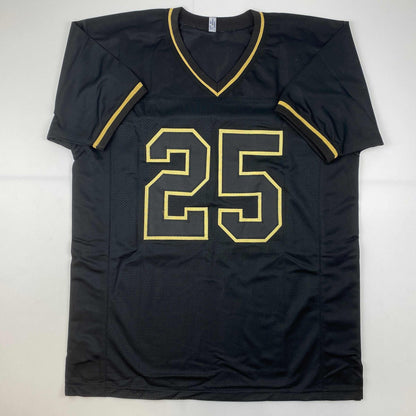 Autographed/Signed Clyde Edwards-Helaire Kansas City Blackout Football Jersey Beckett BAS COA