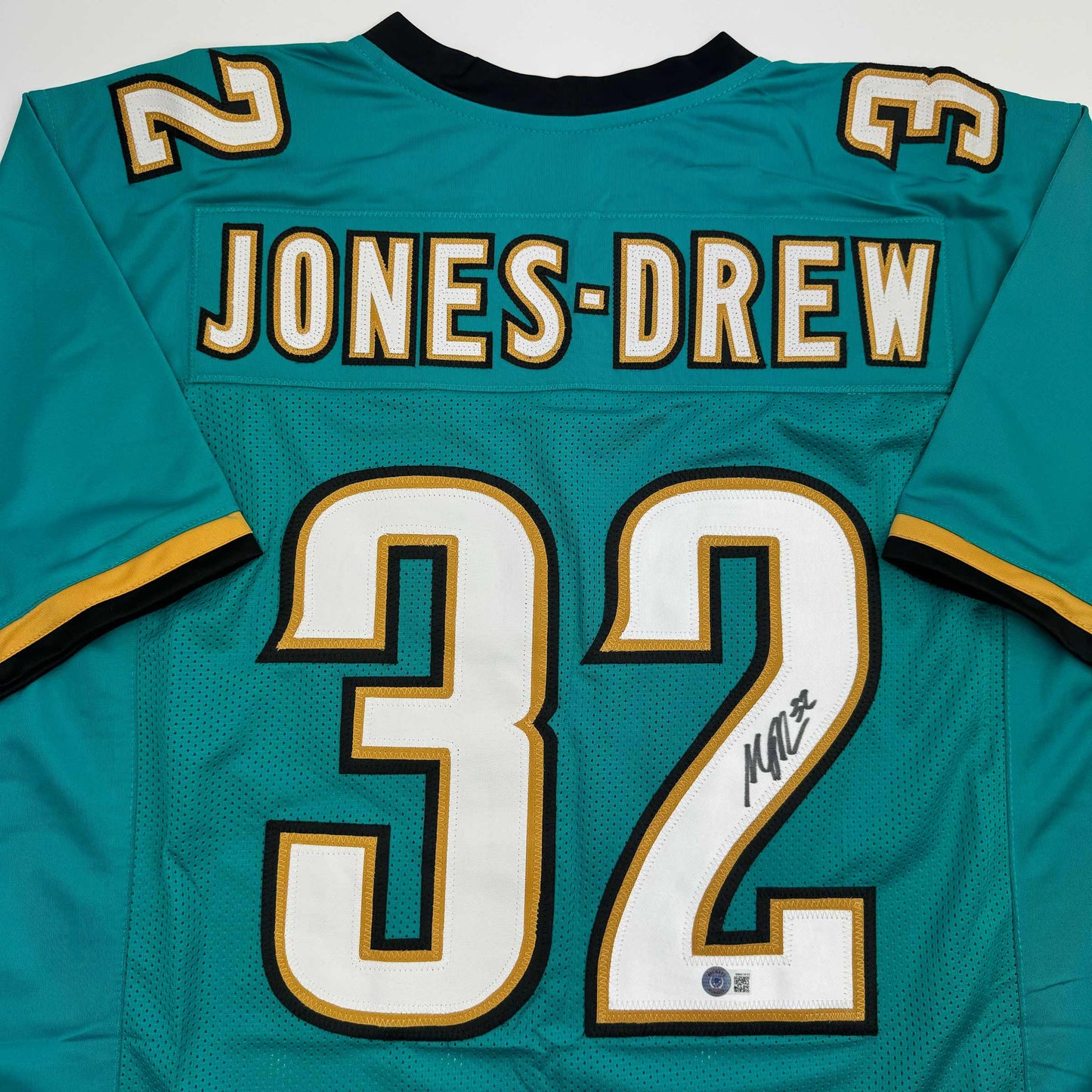 Autographed/Signed Maurice Jones-Drew Jacksonville Teal Football Jersey Beckett BAS COA