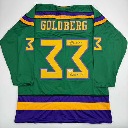 Autographed/Signed Shaun Weiss Greg Goldberg The Mighty Ducks Green Hockey Jersey Beckett BAS COA