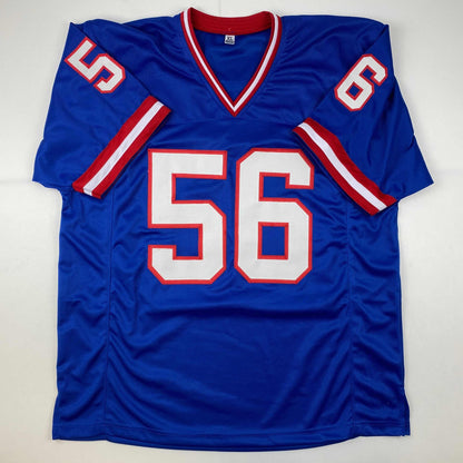 Autographed/Signed Lawrence Taylor New York Blue USA American Flag Football Jersey Beckett BAS COA