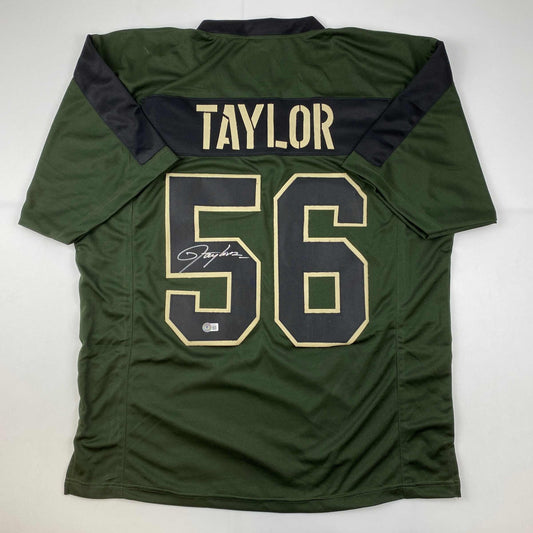 Autographed/Signed Lawrence Taylor New York Green Salute To Service Football Jersey Beckett BAS COA