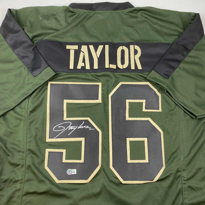 Autographed/Signed Lawrence Taylor New York Green Salute To Service Football Jersey Beckett BAS COA