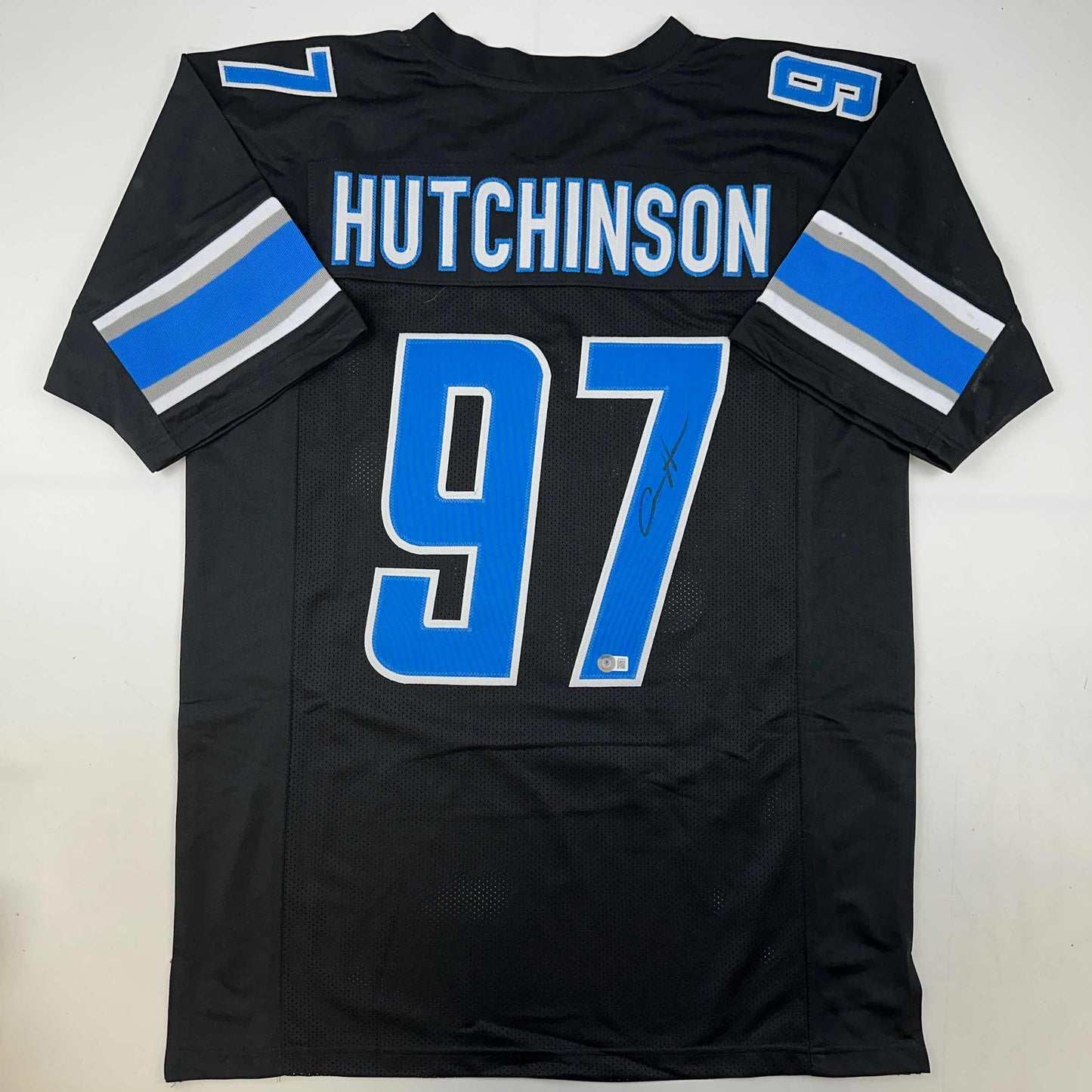 Autographed/Signed Aidan Hutchinson Detroit Black Football Jersey Beckett BAS COA