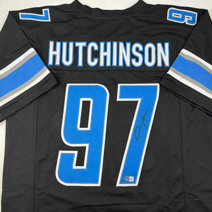 Autographed/Signed Aidan Hutchinson Detroit Black Football Jersey Beckett BAS COA