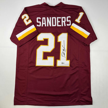 Autographed/Signed Deion Sanders Washington Burgundy Football Jersey Beckett BAS COA