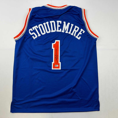 Autographed/Signed Amare Stoudemire New York Blue Basketball Jersey Beckett BAS COA