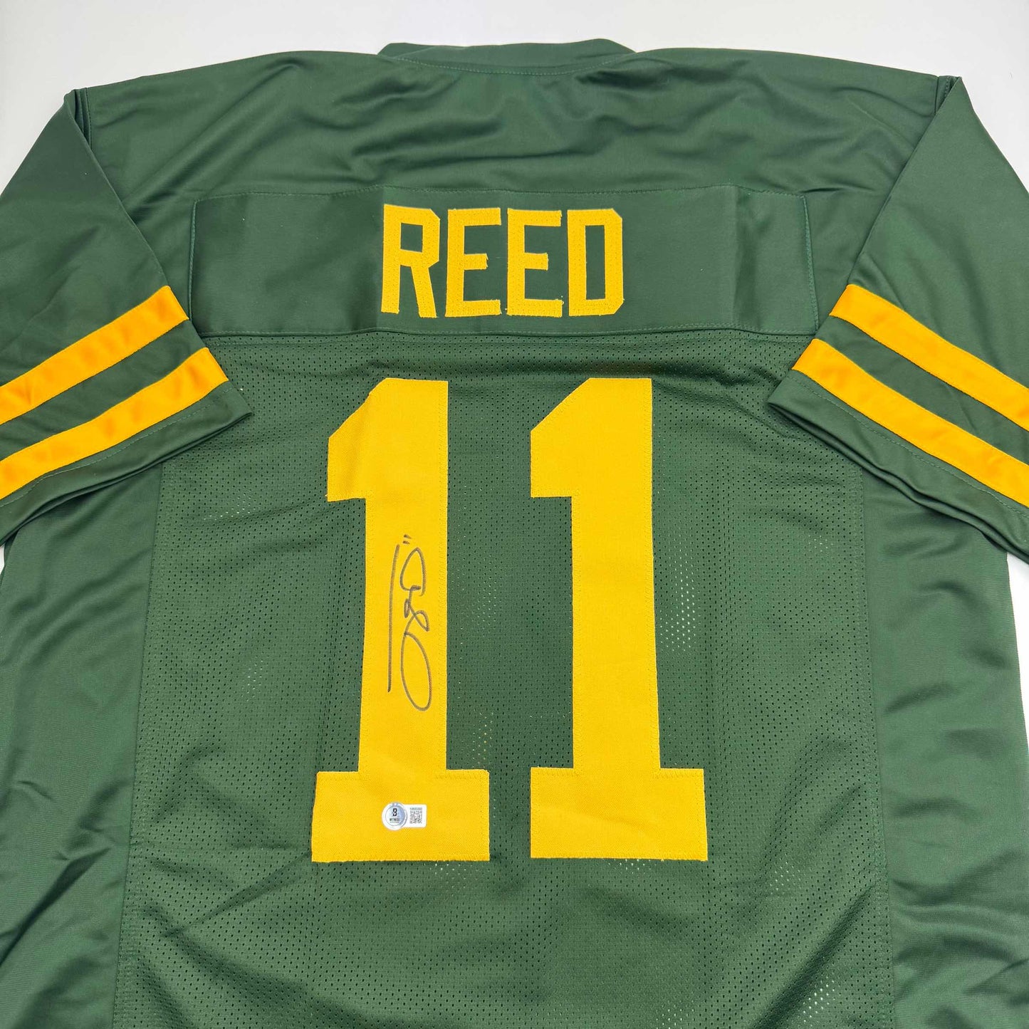 Autographed/Signed Jayden Reed Green Bay Color Rush Football Jersey Beckett BAS COA