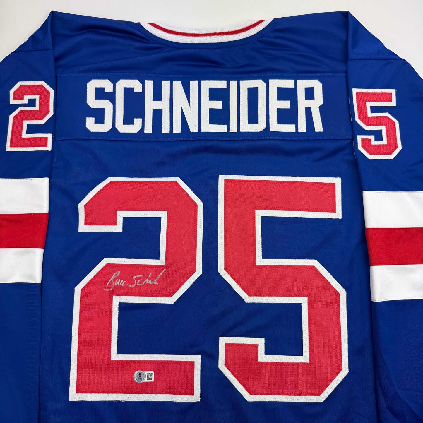 Autographed/Signed Buzz Schneider Blue Team USA Miracle On Ice 1980 Olympics Hockey Jersey Beckett BAS COA