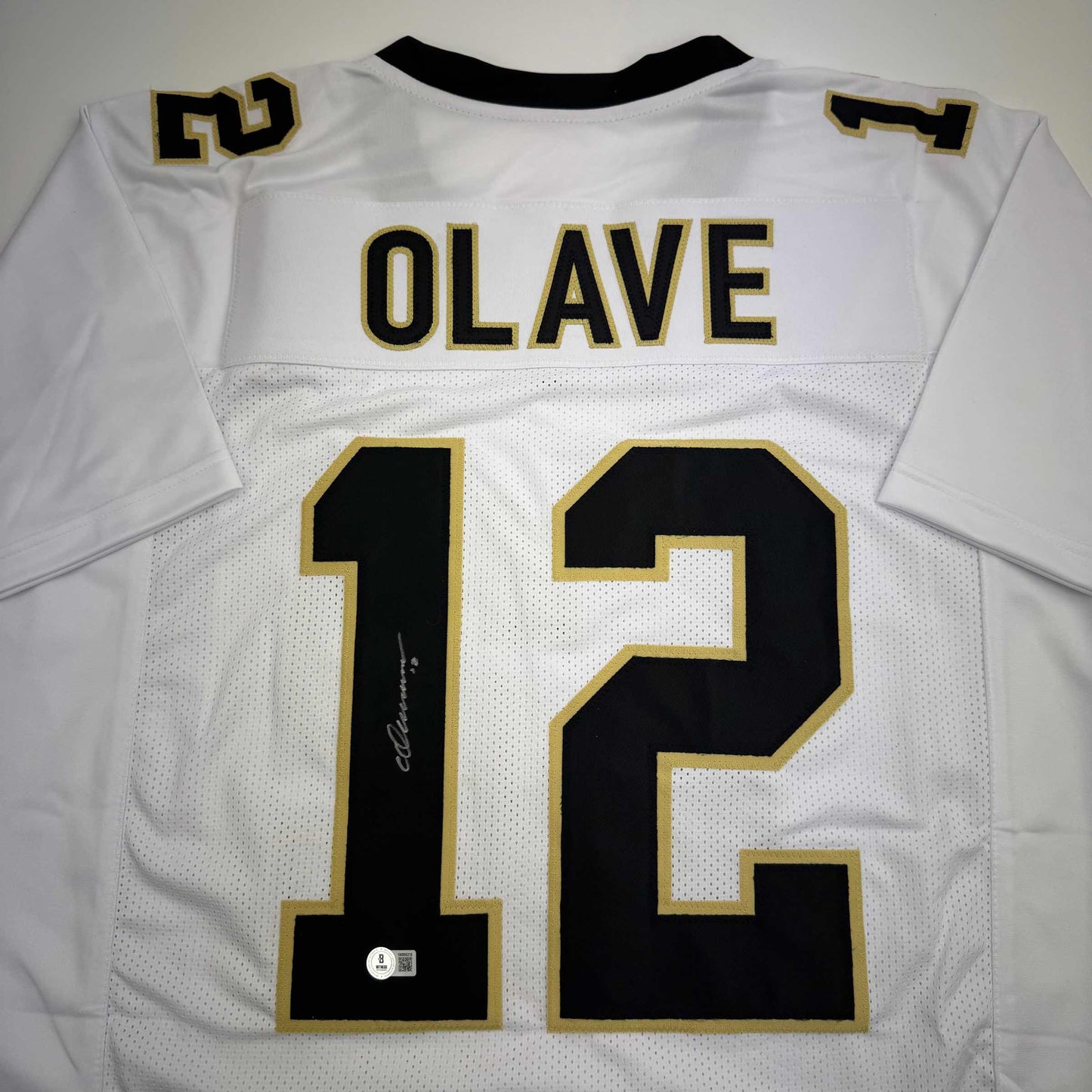 Autographed/Signed Chris Olave New Orleans White Football Jersey Beckett BAS COA