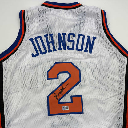 Autographed/Signed Larry Johnson New York White Basketball Jersey Beckett BAS COA
