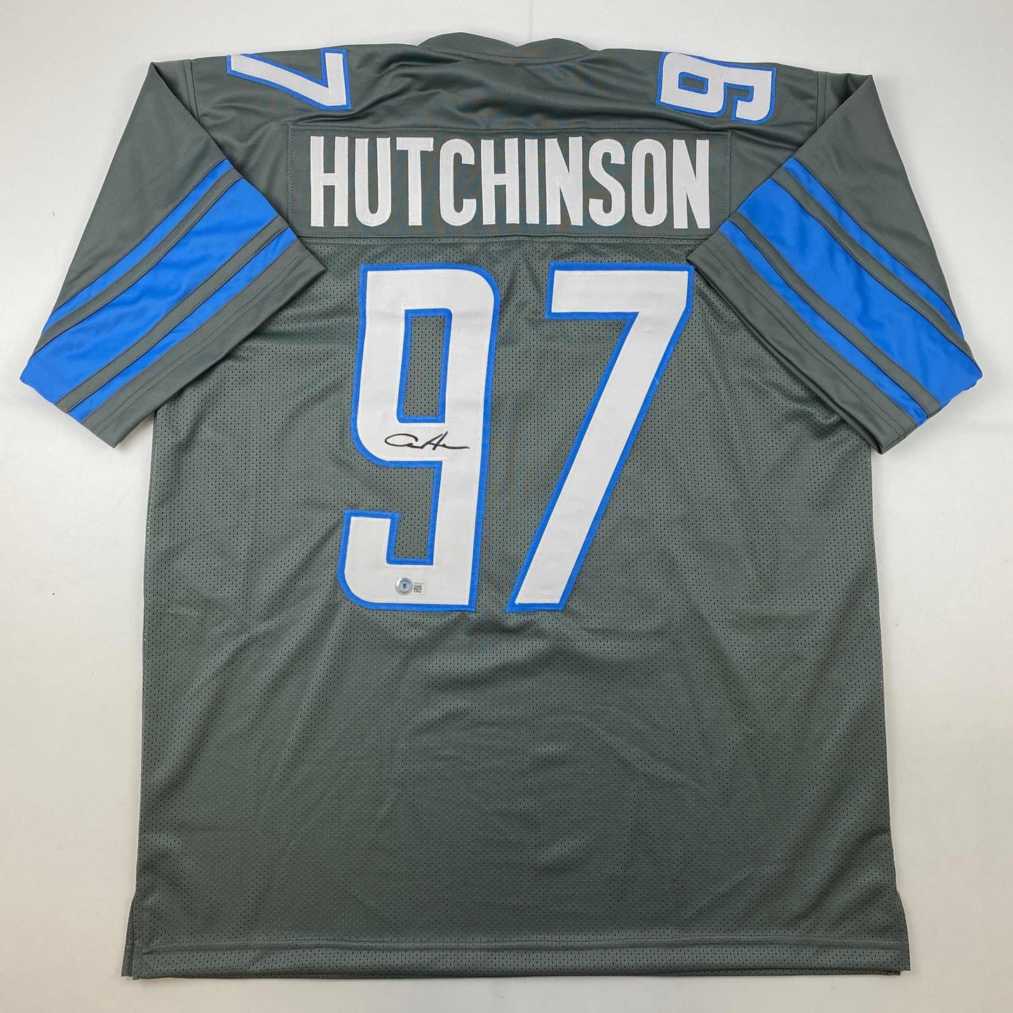 Autographed/Signed Aidan Hutchinson Detroit Grey Football Jersey Beckett BAS COA