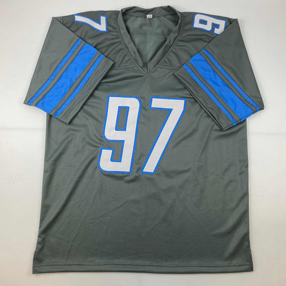 Autographed/Signed Aidan Hutchinson Detroit Grey Football Jersey Beckett BAS COA